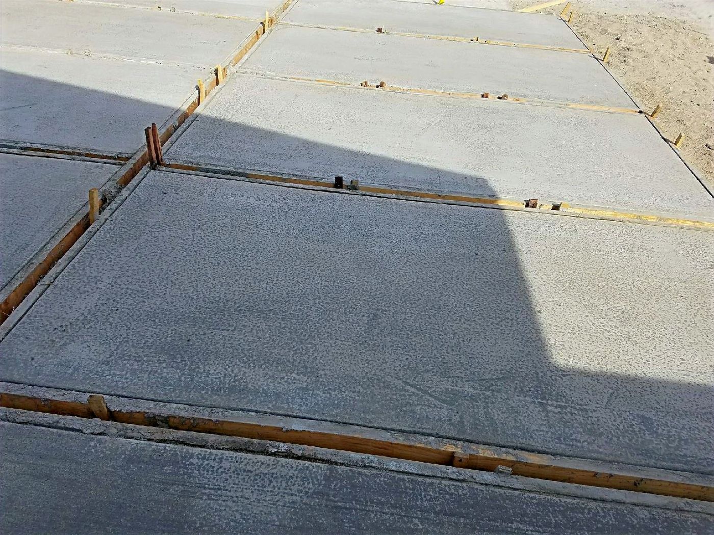 Fresh concrete pour with forms in place on a Palm Springs driveway